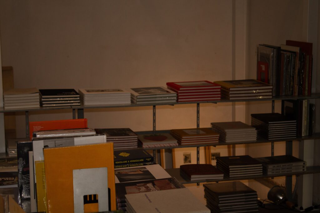Curated photography books collection at Micamera bookstore, Milano