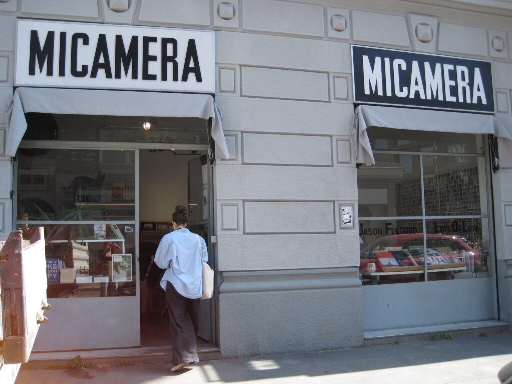 Photography book browsing experience at Micamera bookstore