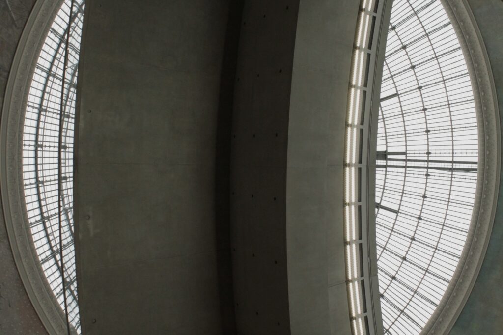 Kimsooja's circular mirror installation reflecting visitors at La Bourse de Commerce Paris