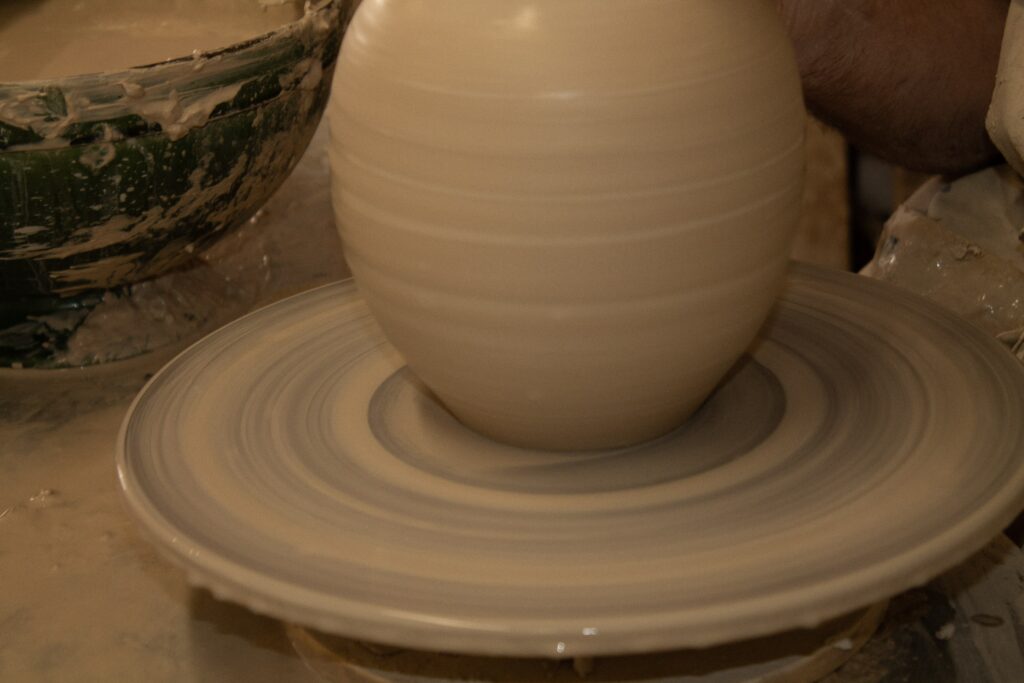 Tino Aiello working with clay using artisan techniques in Vallauris