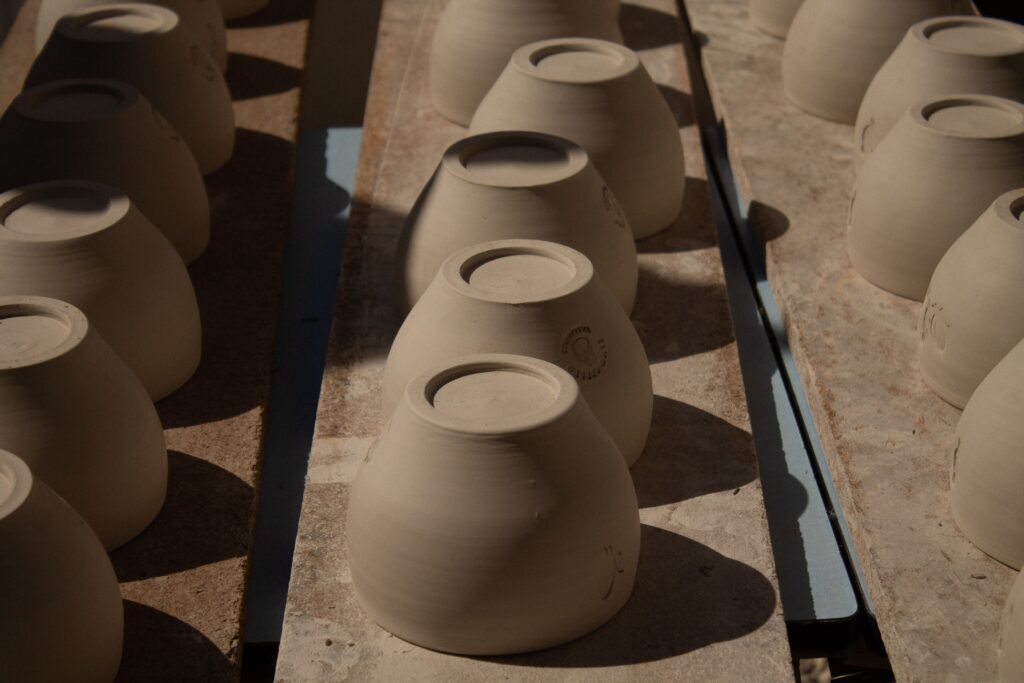Collection of curved ceramic pieces by artisan Tino Aiello