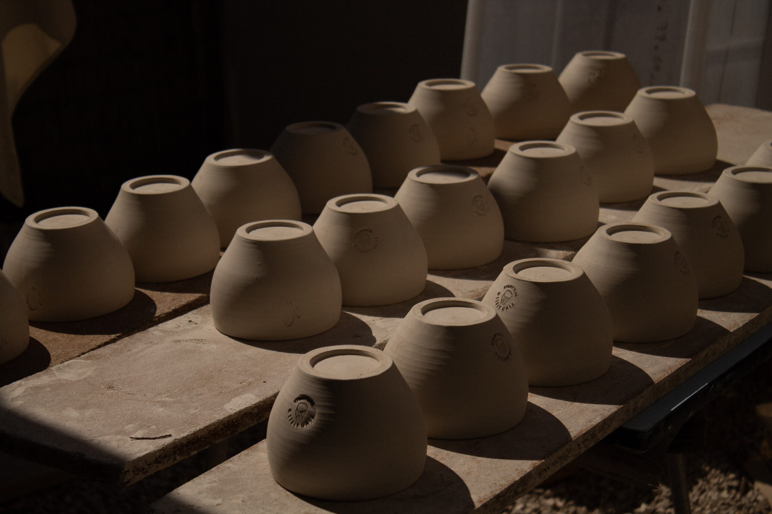 Collection of curved ceramic pieces by artisan Tino Aiello
