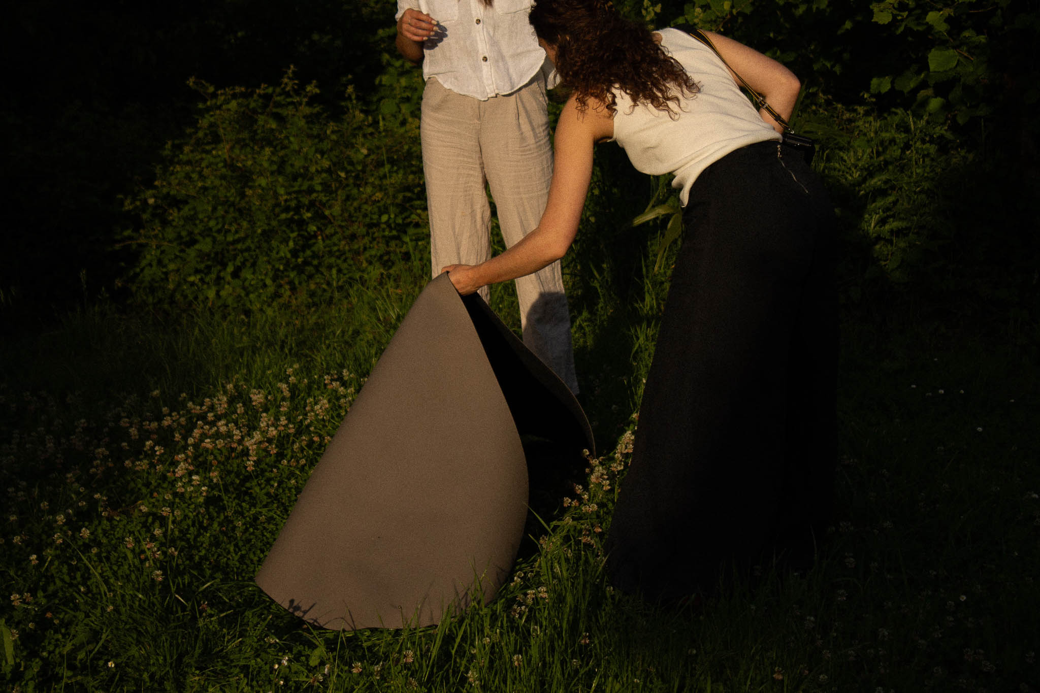 Ailār yoga natural setting photography for wellness brand.