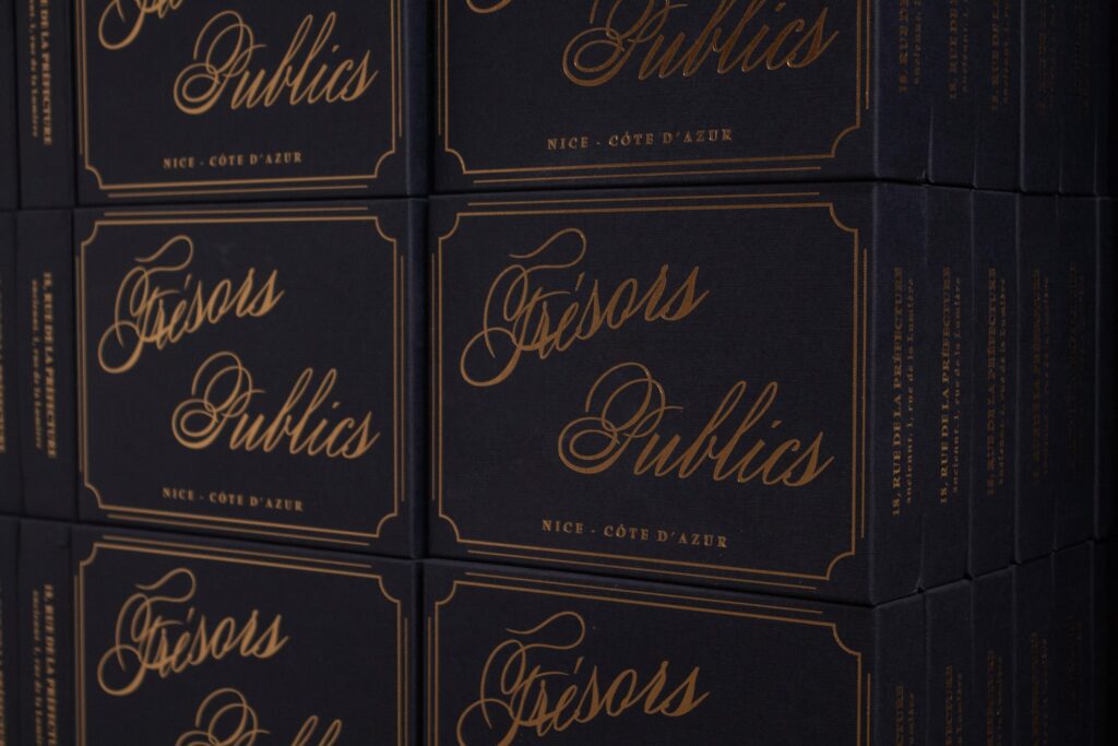Beautifully wrapped gift packages showcasing French artisan products from Trésors Publics boutique