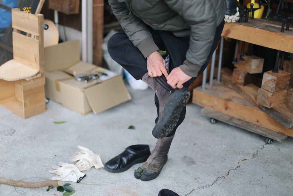 Isamu Hazama with sugi logs — Wakayama, Japan
